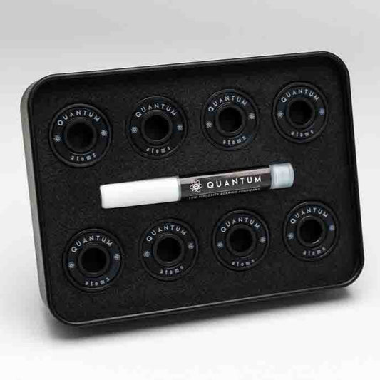 Black tray with multipleQuantum branded holes and a marker on a white background