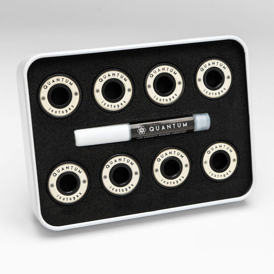 Set of Quantum bearings on a black tray with a white background