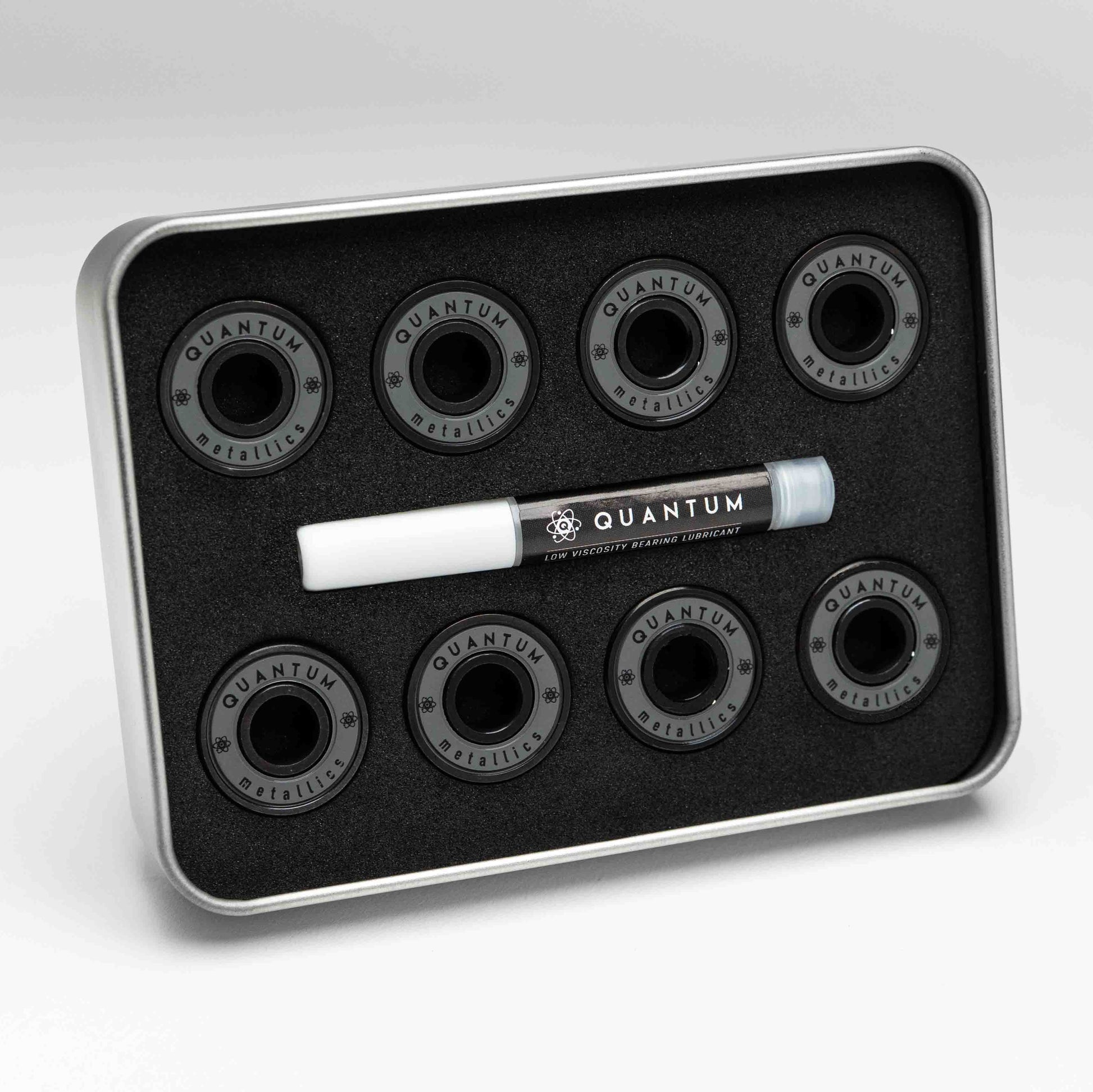 Set of Quantum bearings in a black tray on a white background