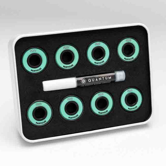 Set of quantum wheel bearings on a black tray with a white background