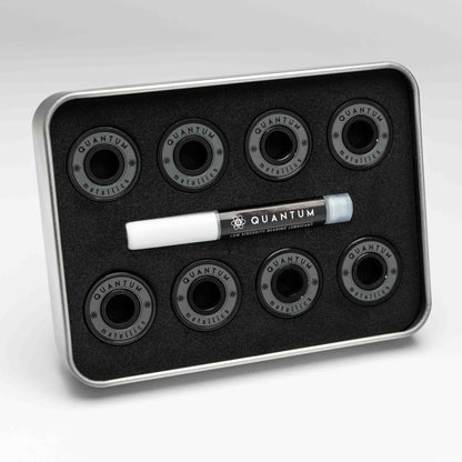 Set of Quantum bearings in a black tray on a white background